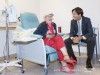 health-minister-dr-eric-hoskins-chats-with-a-chemo-patient
